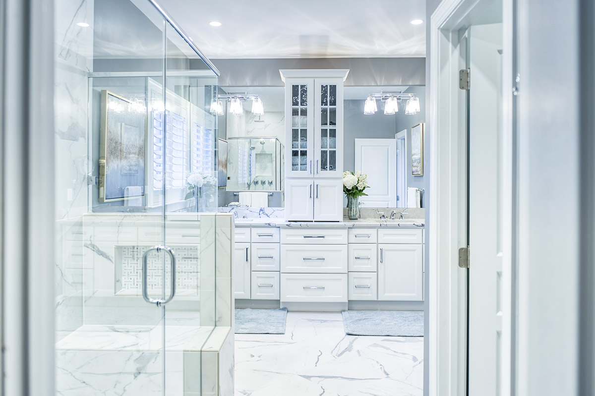 Bright White and Chrome Owner's Bathroom
